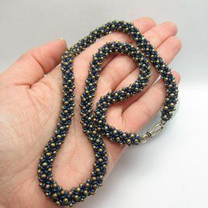 Handstitched drop and Demi round necklace